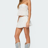 Dora Eyelet Flared Mini Skirt