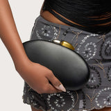 Abstract Oval Mixed Metal Clutch Bag