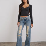 Low Rise Twisted Seam Ripped Jean in True Blue