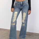 Low Rise Twisted Seam Ripped Jean in True Blue